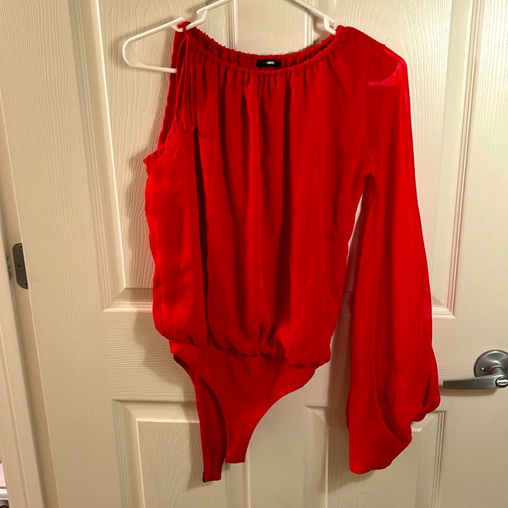 Red top with one puff sleeve